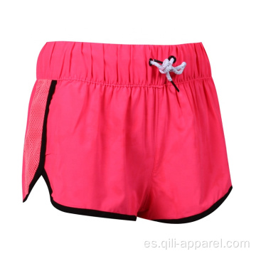 Pantalones cortos de playa de natación con tablero elástico transpirable de color sólido